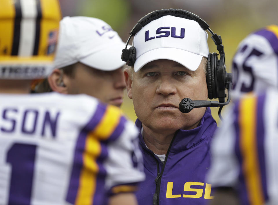 LSU head coach Les Miles talks to his team during the second quarter of the Outback Bowl NCAA college football game against Iowa Wednesday, Jan. 1, 2014, in Tampa, Fla. (AP Photo/Chris O'Meara)