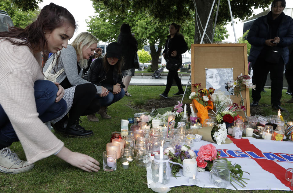 People lay flowers and light candles during a candlelight vigil for murdered British tourist Grace Millane at Cathedral Square in Christchurch. Source: AAP