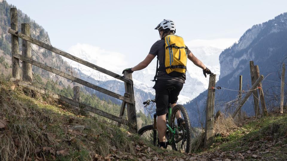 cyclist with pack on back