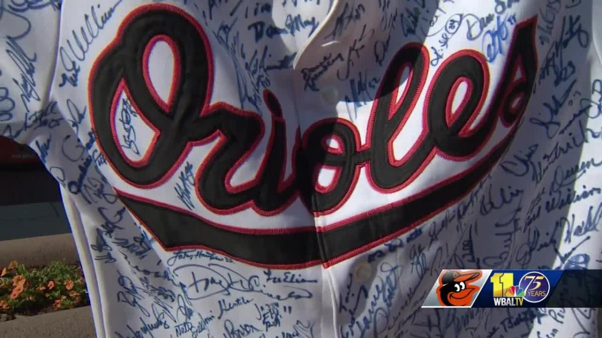 Orioles fan collects hundreds of autographs from former players