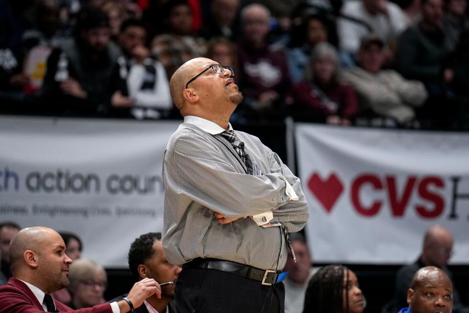 Harvest Prep head coach David Dennis Sr. watches the fourth quarter of a OHSAA Division III state semifinal vs. Lutheran East, Mach 18, 2023, in Dayton.