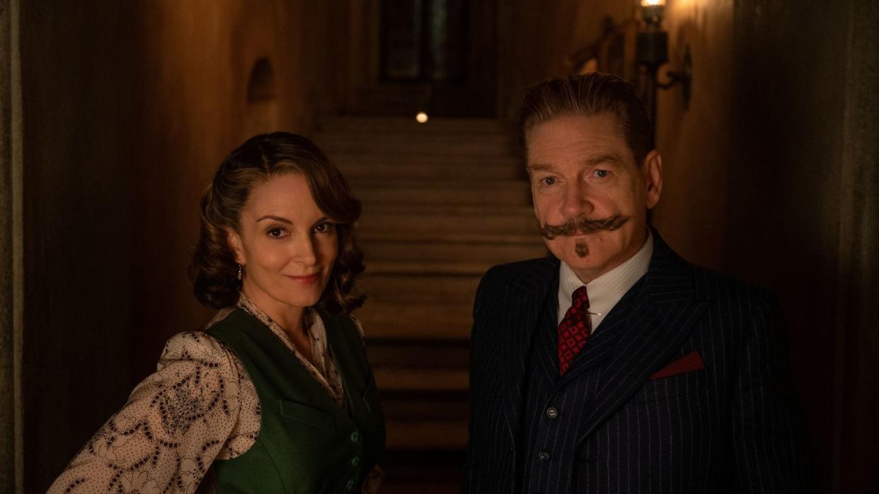 l r tina fey as ariadne oliver and kenneth branagh as hercule poirot in 20th century studios' a haunting in venice photo by rob youngson 2023 20th century studios all rights reserved