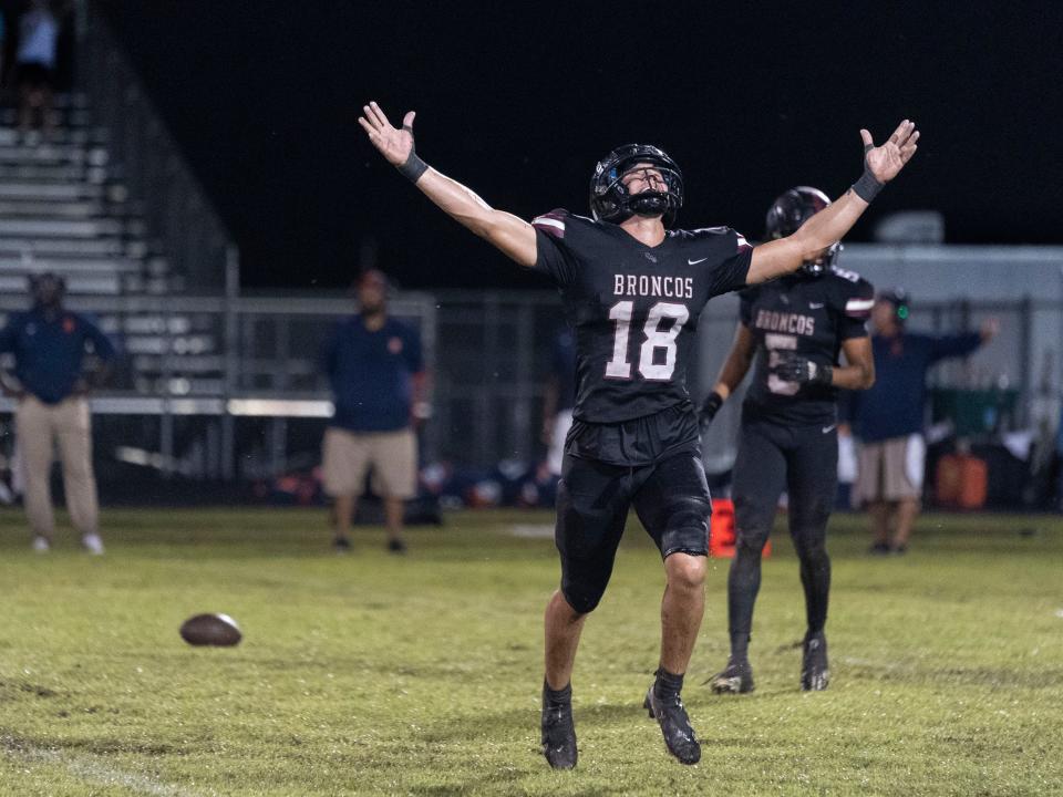 Palm Beach Central's Mario Vitola celebrates their 27-24 win over Benjamin during their game in Wellington, Florida on October 6, 2023.