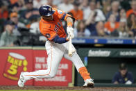 Houston Astros' Jeremy Pena hits a three-run home run against the Milwaukee Brewers during the fifth inning of a baseball game Friday, May 17, 2024, in Houston. (AP Photo/Eric Christian Smith)