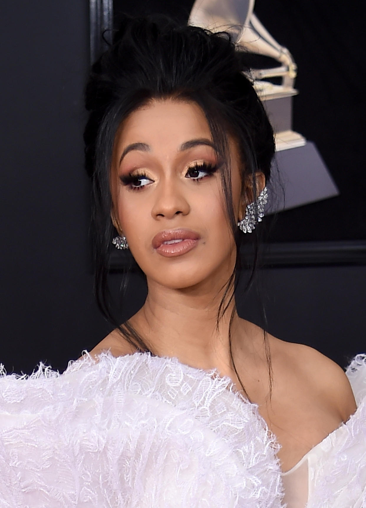 The selfie is a major departure for Cardi B, who went glam at the 2018 Grammys. (Photo: Dimitrios Kambouris/Getty Images for NARAS)