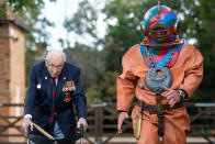 EMBARGOED TO 0001 FRIDAY SEPTEMBER 25 Captain Sir Tom Moore in Wootton, Marston Moretaine, Bedford with veteran fundraiser Lloyd Scott, who will attempt to climb the Three Peaks whilst wearing a deep sea diving suit.