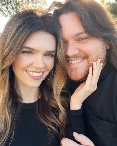 <p>Wolfgang Van Halen Instagram</p> Wolfgang Van Halen and Andraia Allsop announcing their engagement in July 2022.