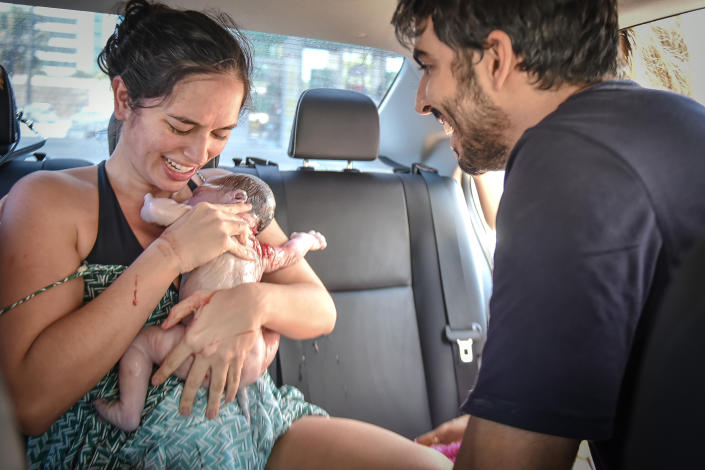 Dr. Gabriela Correia and Gilberto Godoy welcomed their baby in a parked car in Brazil.  (Deborah Ghelman)