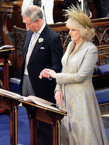 <p>ROTA/Tim Graham Picture Library/Getty</p> Prince Charles and his wife Camilla during the Service of Prayer and Dedication blessing their marriage at Windsor Castle on April 9, 2005.