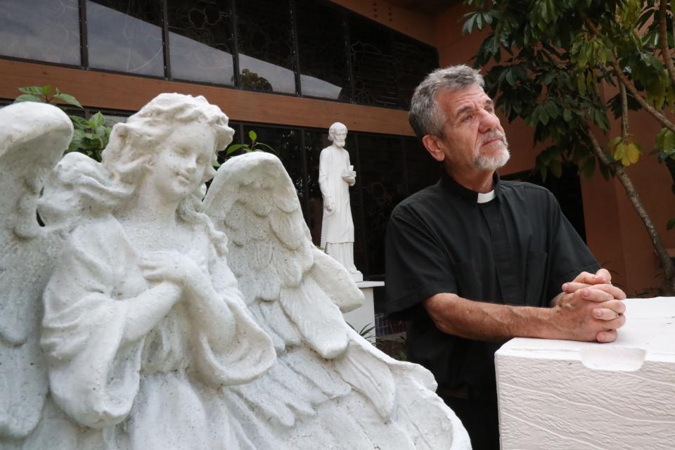 Father Phil Egitto, pastor at Our Lady of Lourdes Catholic Church, talks in the church's prayer garden about the added significance of Easter services against the backdrop of tumultuous times worldwide. “In our community, especially, we connect to those who are suffering and marginalized,” he said. "I believe this community cares a lot." The church will host its annual Easter community sunrise service at 7:30 a.m. Sunday on the beach behind the Daytona Beach Bandshell.
