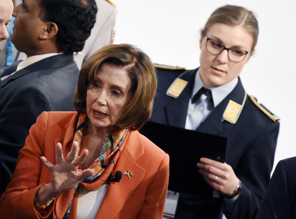 Speaker of the House Nancy Pelosi arrives for the opening session on the first day of the Munich Security Conference in Munich, Germany, Friday, Feb. 14, 2020. (AP Photo/Jens Meyer)b