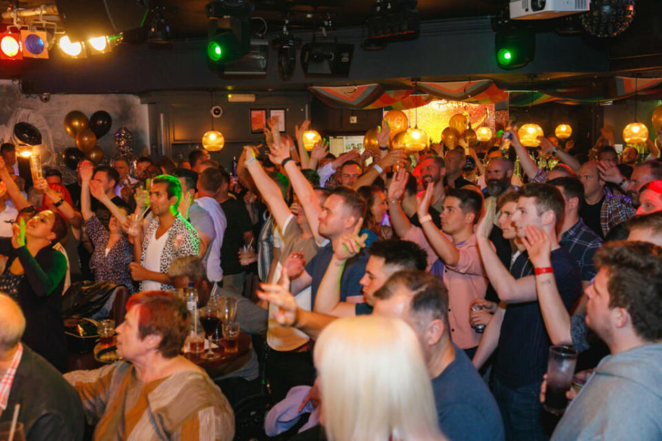 A busy crowd of people at a nightclub