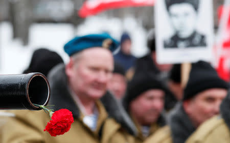 Participants, including veterans of the military campaign, attend a ceremony marking the 30th anniversary of the withdrawal of Soviet troops from Afghanistan at Victory Park, also known as Poklonnaya Gora War Memorial Park, in Moscow, Russia February 15, 2019. REUTERS/Shamil Zhumatov