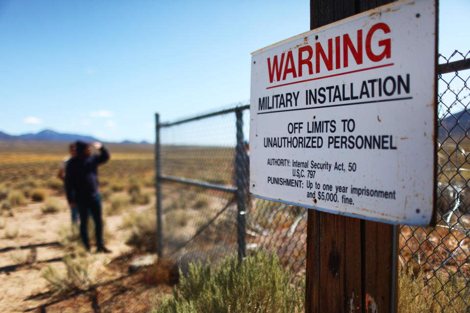 A sign on display at an entrance gate to the Nevada Test and Training Range, located near Area 51, on September 20, 2019 near Rachel, Nevada.  / Credit: Getty Images