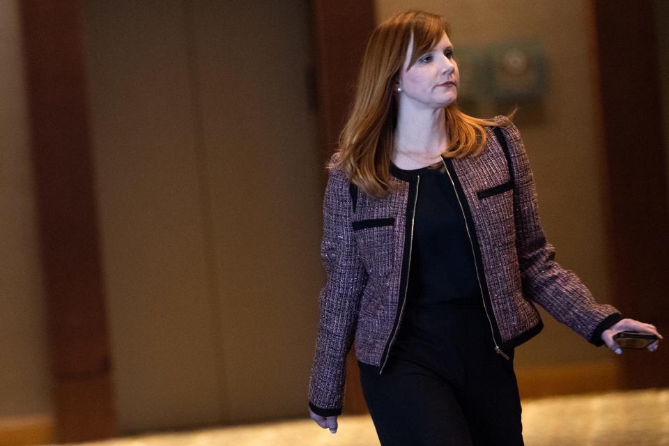 Casey Pruitt, wife of former Tennessee football coach Jeremy Pruitt, walks to the ball room for an infractions hearing with the NCAA at the Westin Cincinnati in Cincinnati, Ohio, on Wednesday, April 19, 2023.  