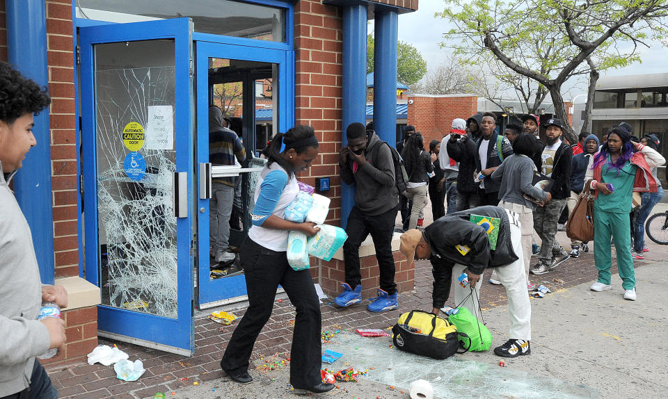 Looters empty the CVS at Pennsylvania and North Avenues during riots on Monday, April 27, 2015, in Baltimore. (Jerry Jackson/Baltimore Sun/TNS via Getty Images)