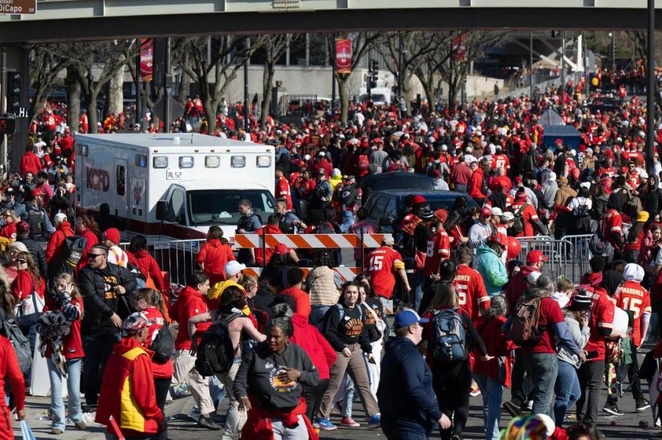 Chiefs fans move toward the exit as an ambulance arrives on scene after shots were fired at the Kansas City Chiefs Super Bowl rally on Wednesday, Feb. 14, 2024, at Union Station in Kansas City.