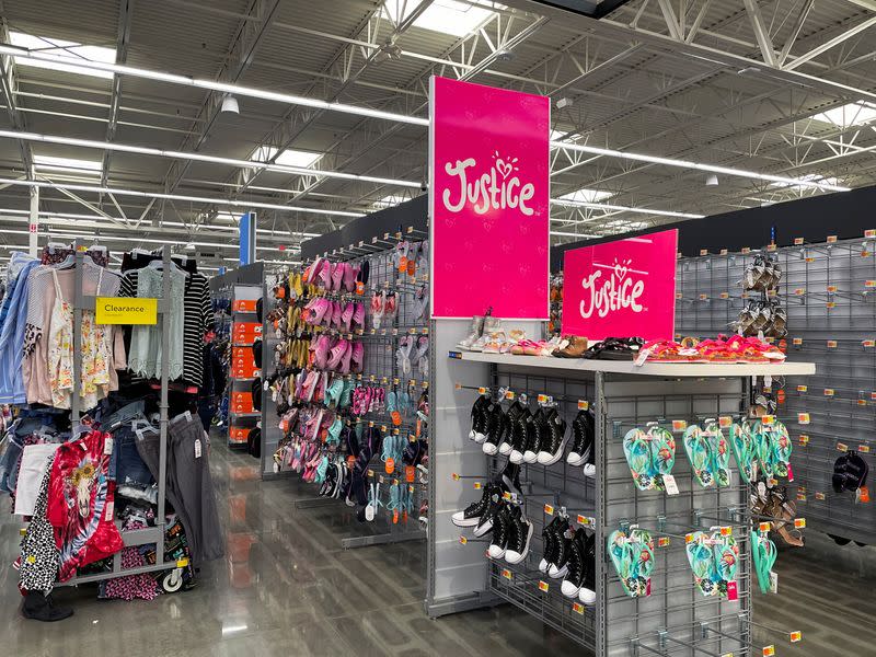 Signage and shoes of the brand Justice are seen at a Walmart's newly remodeled store, in Teterboro