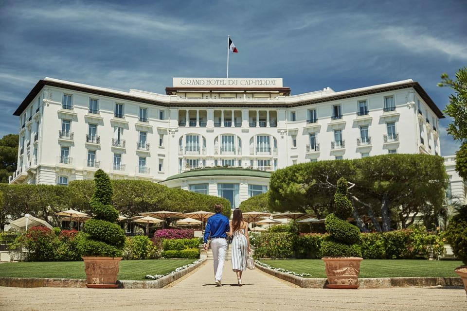 The winged 1908 building sits in perfectly manicured gardens leading down, eventually, to the sea (Martino Dini)