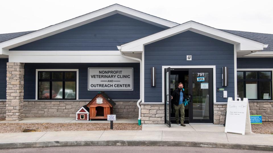 A customer heads out of the Monroe County Humane Society’s Nonprofit Veterinary Clinic and Outreach Center on Wednesday. (Rich Janzaruk / Herald-Times)