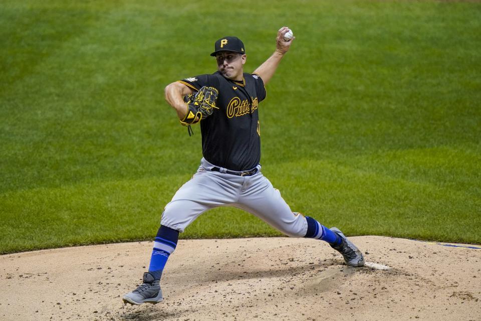 Pittsburgh Pirates starting pitcher Derek Holland throws during the third inning of a baseball game against the Milwaukee Brewers Friday, Aug. 28, 2020, in Milwaukee. (AP Photo/Morry Gash)