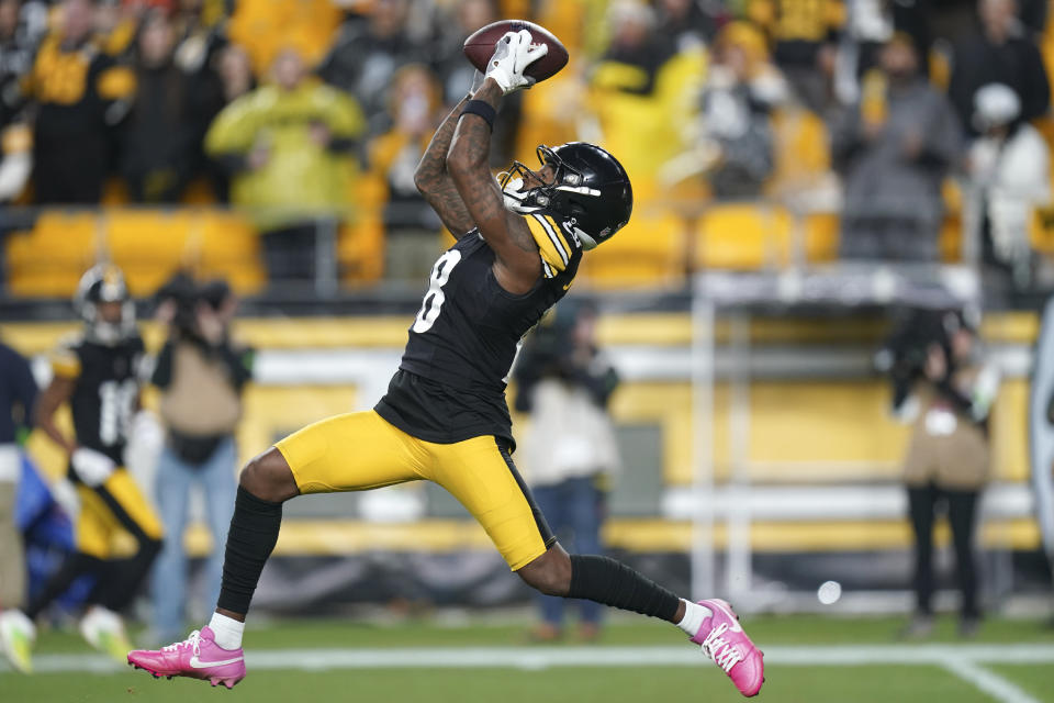 Pittsburgh Steelers wide receiver Diontae Johnson makes a leaping catch against the Arizona Cardinals during the second half of an NFL football game Sunday, Dec. 3, 2023, in Pittsburgh. (AP Photo/Matt Freed)