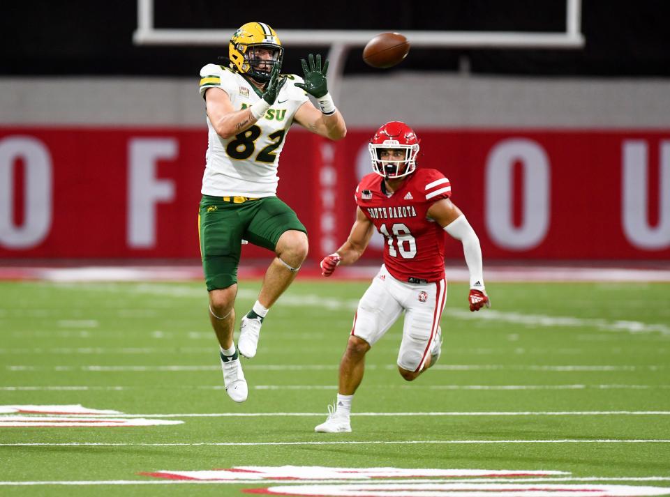 North Dakota State’s Joe Stoffel jumps to catch a pass that he ultimately fumbles on Saturday, September 24, 2022, at the DakotaDome in Vermillion.