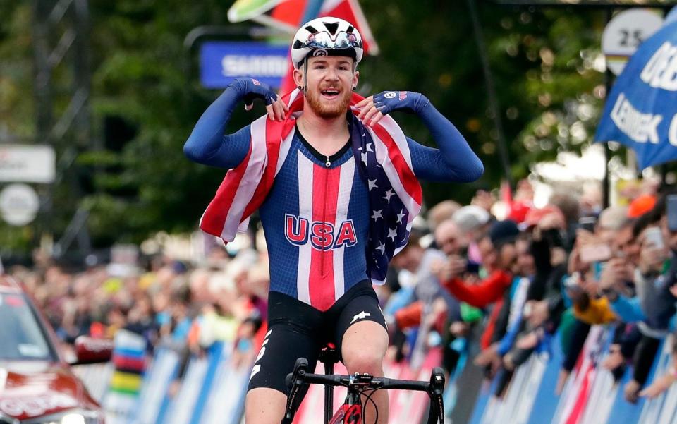 Quinn Simmons celebrates winning the men's junior event, at the road cycling World Championships in Harrogate, England. American cyclist Quinn Simmons was suspended by the Trek-Segafredo team on Thursday Oct. 1, 2020, for social media comments supporting President Donald Trump. - AP/Manu Fernandez 