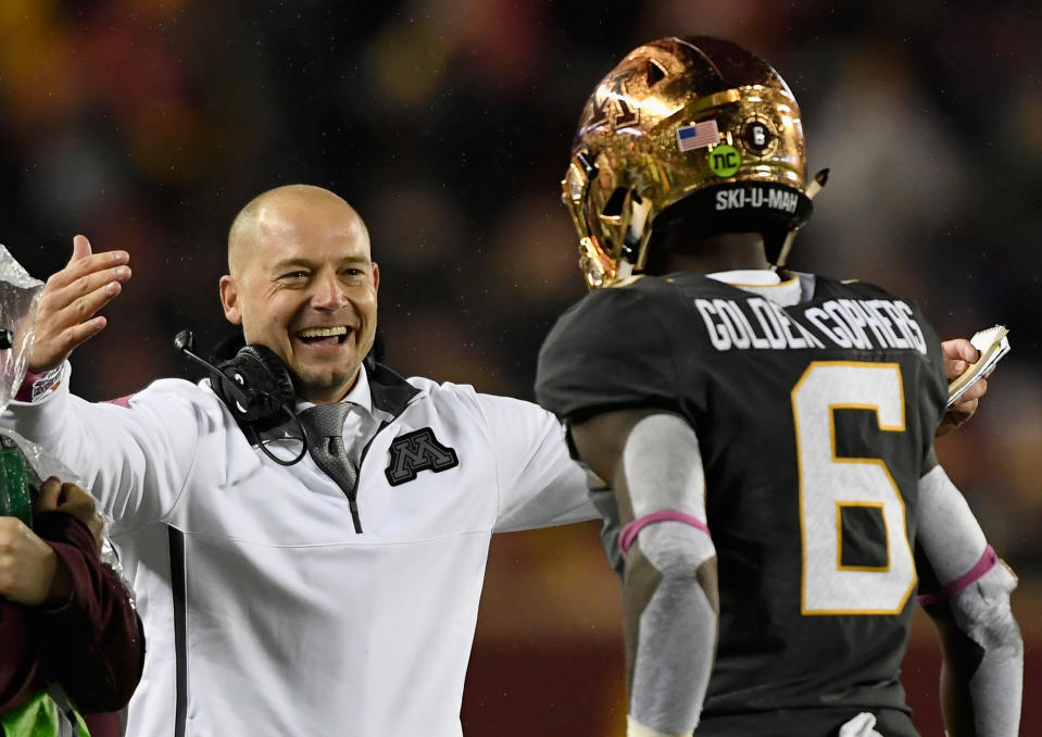 Minnesota head coach P.J. Fleck congratulates Tyler Johnson on scoring a touchdown against Indiana (Getty Images).