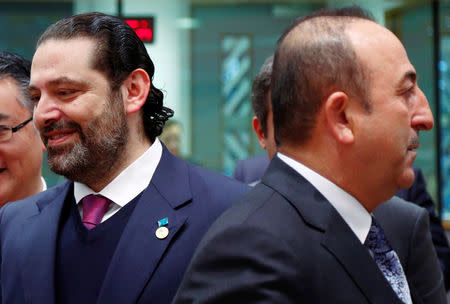 Lebanese Prime Minister Saad Al-Hariri and Turkish Foreign Minister Mevlut Cavusoglu attend an international peace and donor conference for Syria, at the European Union Council in Brussels, Belgium March 14, 2019. REUTERS/Francois Lenoir