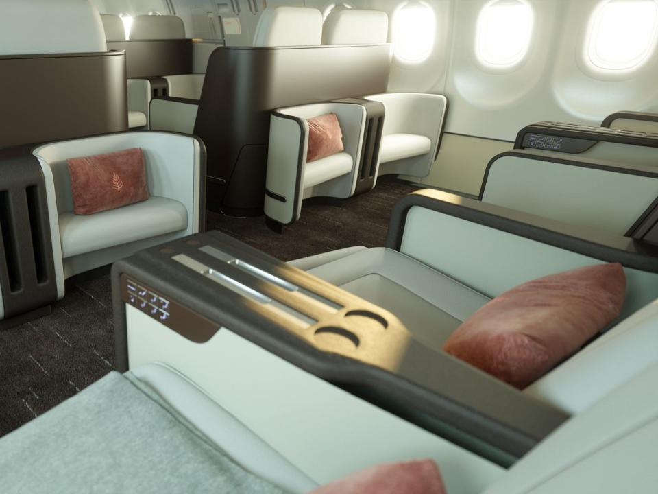 Inside the private jet with seating areas.