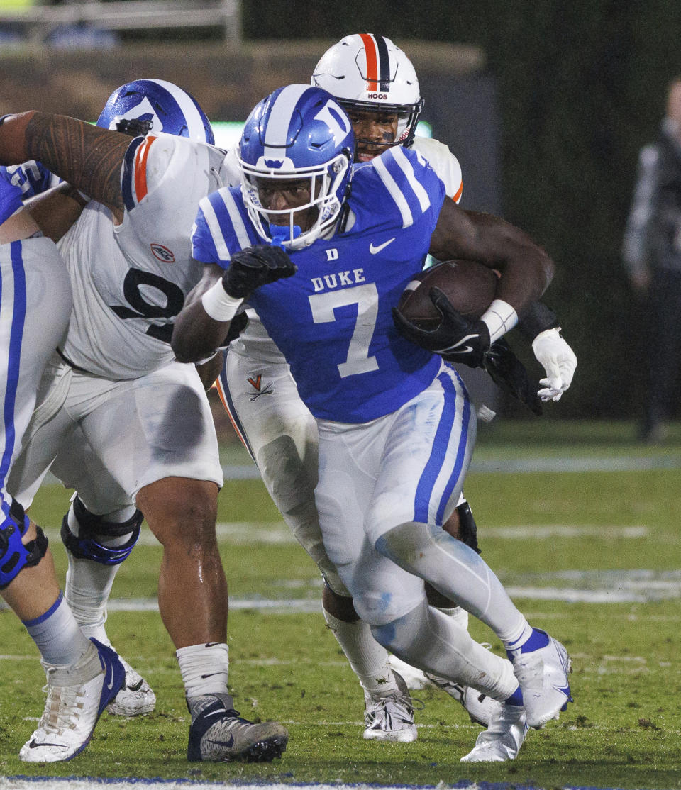 Duke's Jordan Waters (7) carries the ball during the first half of the team's NCAA college football game against Virginia in Durham, N.C., Saturday, Oct. 1, 2022. (AP Photo/Ben McKeown)