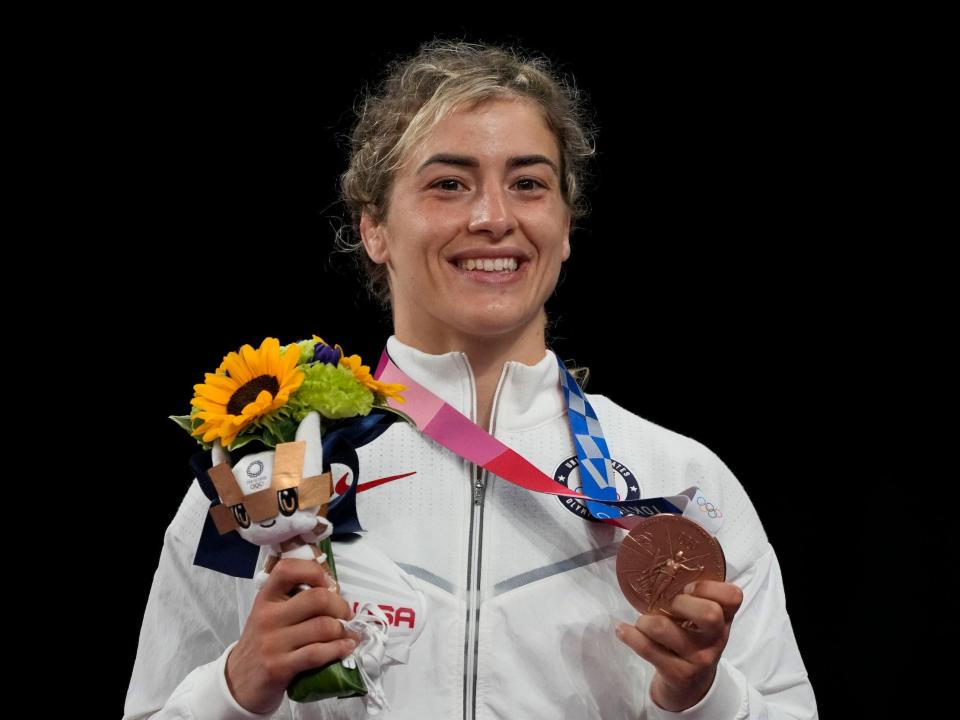 Helen Maroulis poses with her bronze medal from the Tokyo Olympics.
