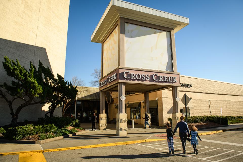 Shoppers at one of the entrances at Cross Creek Mall on Tuesday, Dec. 12, 2023.