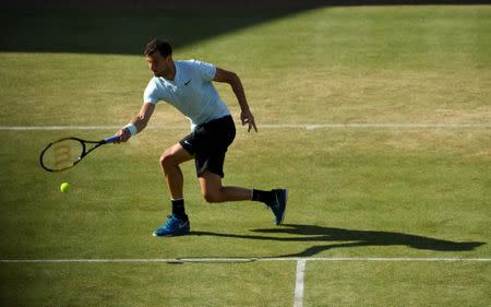 Tennis - ATP 500 - Fever-Tree Championships - The Queen's Club, London, Britain - June 21, 2018 Bulgaria's Grigor Dimitrov in action during his second round match against Serbia's Novak Djokovic Action Images via Reuters/Tony O'Brien