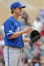 Kansas City Royals starting pitcher Zack Greinke reacts after giving up back-to-back solo home runs to the Minnesota Twins in the fourth inning of a baseball game Sunday, May 29, 2022, in Minneapolis. (AP Photo/Bruce Kluckhohn)