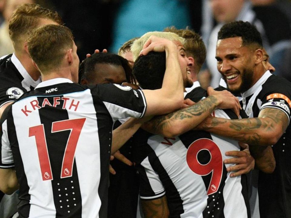 Newcastle celebrate taking the lead against Arsenal (AFP via Getty Images)