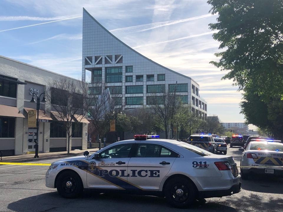 Louisville Metro Police are on the scene of an "active police situation" that includes mass casualties on Monday, April 10, 2023, on East Main Street in downtown Louisville.