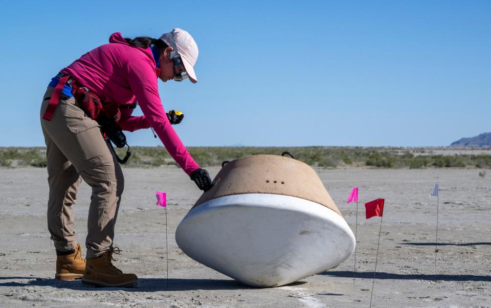 Recovery teams participate in field rehearsals in preparation for the retrieval of the sample return capsule from Nasa's OSIRIS-REx mission