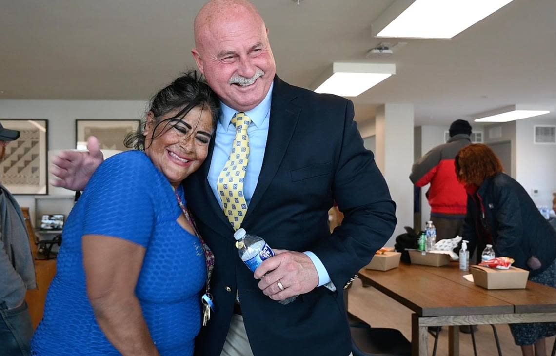 An excited and thankful Roberta Lopez, a resident of The Link @ Blackstone, thanks Fresno Mayor Jerry Dyer for the new senior community center that opened with a ribbon-cutting ceremony Monday, Nov. 28, 2022, in Fresno.