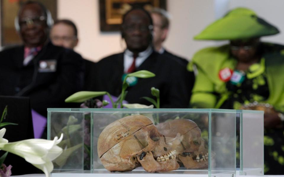 FILE - In this Thursday, Sept. 29, 2011 file photo skulls of Ovaherero and Nama people are displayed during a devotion attended by representatives of the tribes from Namibia in Berlin, Germany. Germany has reached an agreement with Namibia that will see it officially recognize as genocide the colonial-era killings of tens of thousands of people and commit to spending a total of 1.1 billion euros ($1.3 billion), largely on development projects. (AP Photo/Michael Sohn) - Michael Sohn/AP