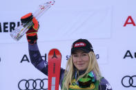 The winner United States' Mikaela Shiffrin celebrates after completing an alpine ski, women's World Cup giant slalom, in Semmering, Austria, Tuesday, Dec. 27, 2022. (AP Photo/Giovanni Auletta)
