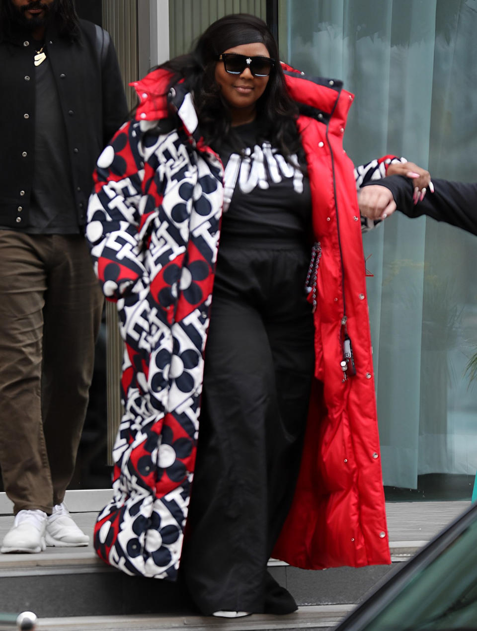 <p><a href="https://people.com/tag/lizzo/" rel="nofollow noopener" target="_blank" data-ylk="slk:Lizzo;elm:context_link;itc:0" class="link ">Lizzo</a> leaves her hotel ahead of her sold-out concert at the Manchester AO Arena in Manchester, England, on March 12.</p>