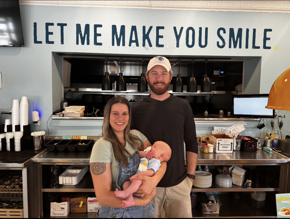 Conley McIntyre, owner of six Eggs Up Grill locations in the Upstate, alongside his wife, Kayla, and their son Conley McIntyre IV