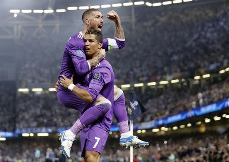 Britain Soccer Football - Juventus v Real Madrid - UEFA Champions League Final - The National Stadium of Wales, Cardiff - June 3, 2017 Real Madrid's Cristiano Ronaldo celebrates scoring their first goal with Sergio Ramos Reuters / Eddie Keogh Livepic