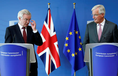 Britain's Secretary of State for Exiting the European Union David Davis (L) and European Union's chief Brexit negotiator Michel Barnier talk to the media, ahead of Brexit talks in Brussels, Belgium August 28, 2017. REUTERS/Francois Lenoir/Files