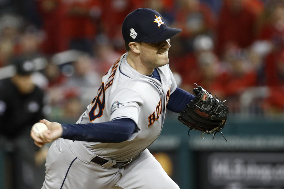 Houston Astros relief pitcher Joe Smith throws against the Washington Nationals during the eighth inning of Game 3 of the baseball World Series Friday, Oct. 25, 2019, in Washington. (AP Photo/Patrick Semansky)