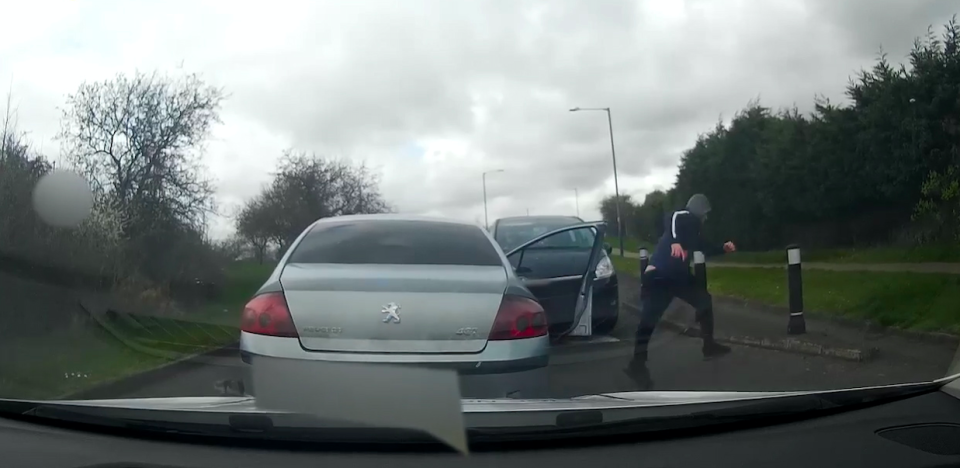 Footage shows Callum Taylor leap out of the car and attempt to flee on foot before being arrested a short distance away. (SWNS)