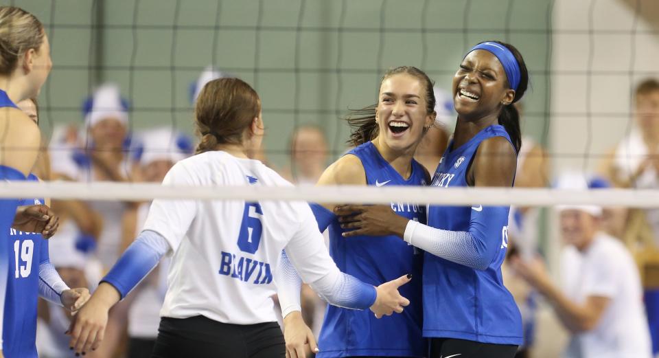 Kentucky’s Adanna Rollins, right, celebrates a score against Louisville.Sept. 14, 2022