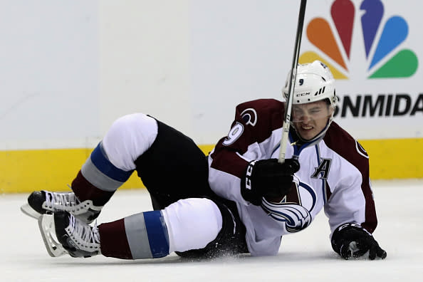 WASHINGTON, DC - OCTOBER 18: Matt Duchene #9 of the Colorado Avalanche hits the ice after flipping over Dmitry Orlov #9 of the Washington Capitals (not pictured) in the first period at Verizon Center on October 18, 2016 in Washington, DC. (Photo by Rob Carr/Getty Images)